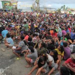Day Eighteen – Super Typhoon Yolanda Thousands of Filipinos gather to receive their pay from the Tzu Chi Foundation