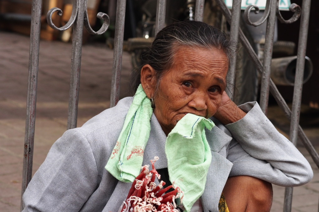 One of Many Women Selling Prayer Candles