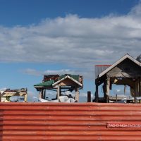 Three houses still standing but largely destroyed by super typhoon Yolanda.