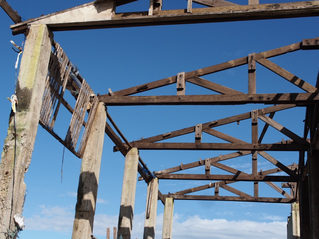 Concrete pillars and wooden roof trusses still holding together after super typhoon Yolanda