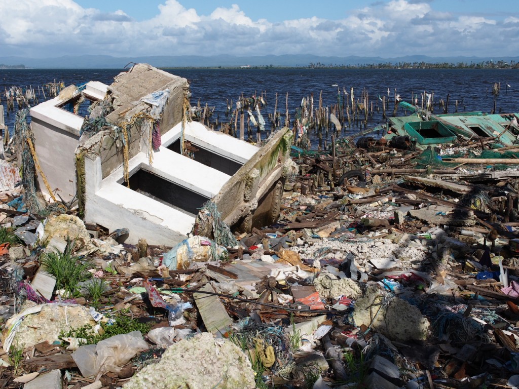 The walls of a concrete room lie flat after super typhoon Yolanda