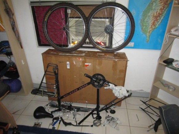 Trying to get a feel for how the bike will go into the box. Covering up the rear derailleur. 