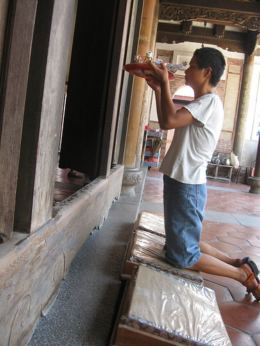 Worshipper at a Temple in Lukang