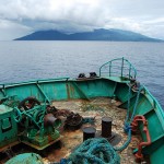 Approaching Cloud-Covered Camiguin