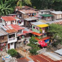 Housing by the river near the temple. 