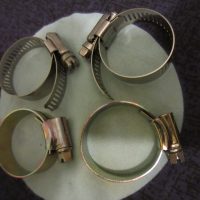 Hose clamps for my assorted water bottle cages.