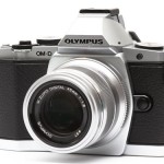 Got my camera back from the Olympus service center.
