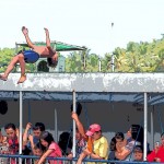Boy Doing a Backflip off a Ferry in Allen