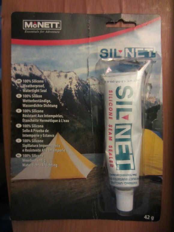 SilNet Seam Sealer from McNett. No idea what being 100% silicone means. Hopefully, it is not now eating through my tent. I just couldn't find any Seam Grip in Taipei. 