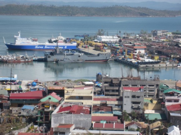 Day 32 Super Typhoon Yolanda – Watching Bad Movies A navy ship docked at Tacloban to deliver relief goods and evacuate people to Cebu or Manila