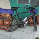 My loaded touring bike sitting outside my hotel room in Carigara