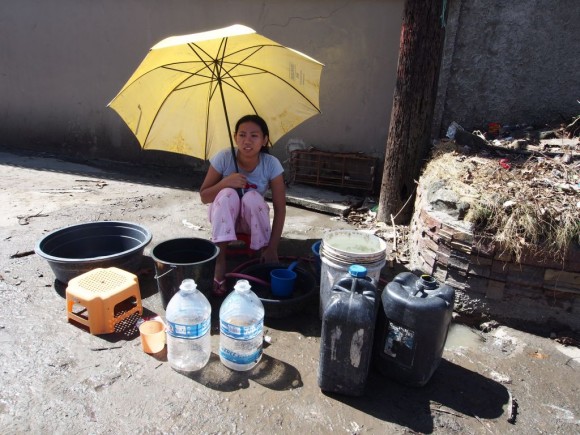 Day Eight – Super-Typhoon Yolanda Gathering up a trickle of water for washing clothes